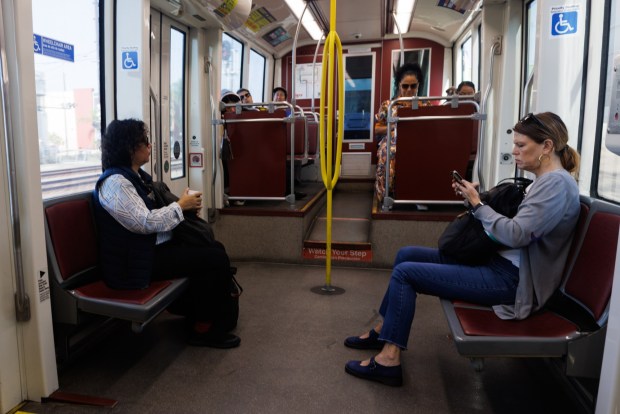 People ride the Green Line trolley toward El Cajon in San Diego on Thursday, Oct. 1, 2026. (Kristian Carreon / The San Diego Union-Tribune)