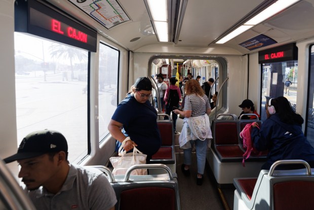 People ride the Green Line trolley toward El Cajon in San Diego on Thursday, Oct. 1, 2026. (Kristian Carreon / The San Diego Union-Tribune)