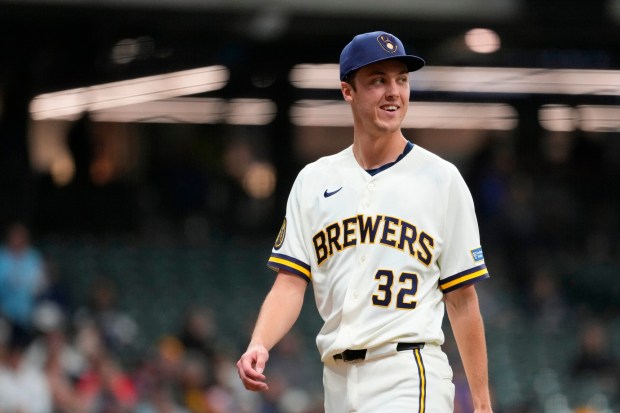Brewers starting pitcher Jacob Misiorowski smiles as he walks to the dugout during the fourth inning of Wednesday's game against the Padres. (AP Photo/Aaron Gash)
