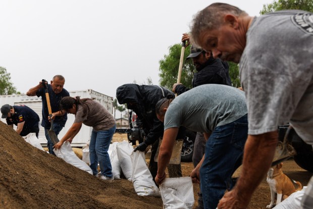 San Diego, California - People fill up sandbags in preparation for Tropical Storm Rachel at Bonita-Sunnyside Fire Department on Saturday, Oct. 10, 2026. (Kristian Carreon / The San Diego Union-Tribune)