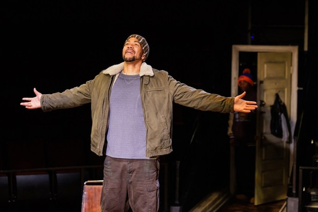 Alano Miller as Lincoln, foreground, and Elijah Jones as Booth, back right, in The Old Globe production of Suzan-Lori Parks' "Topdog/Underdog." (Rich Soublet II)