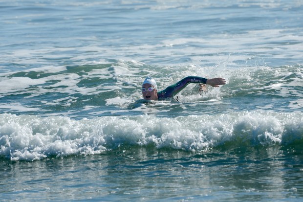 Catherine Breed, 33 from Marin County, reaches the beach at Coronado on Monday, Oct. 19, 2026, in Coronado, CA. Breed began her swim from Brookings, Oregon, to the Mexico border, taking 111 days from the start until Monday, October 19th, and completing nearly 900 miles. (Nelvin C. Cepeda / The San Diego Union-Tribune)