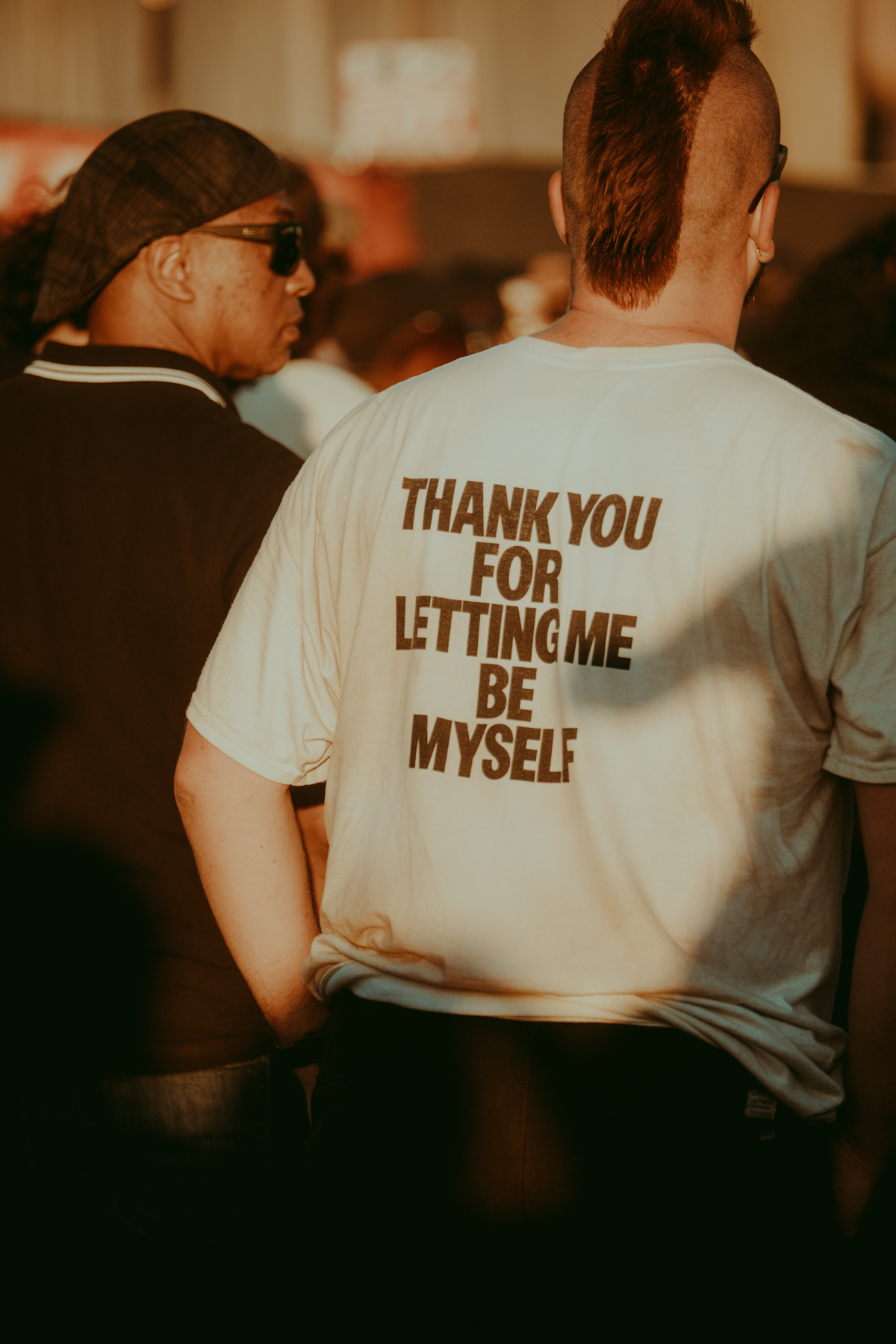 Concert photo of fan wearing a shirt that reads thank you for letting me be myself at Turnstile concert at No Values