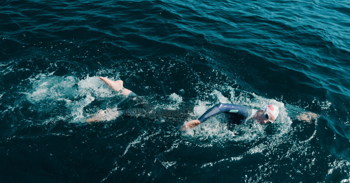 She’s about to break a new record. But she’ll have to swim around sewage pollution first