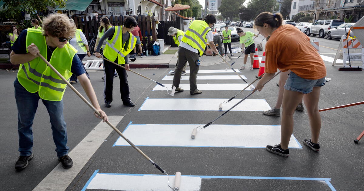 Risking arrest, he paints illicit crosswalks in L.A. 'We can’t wait'