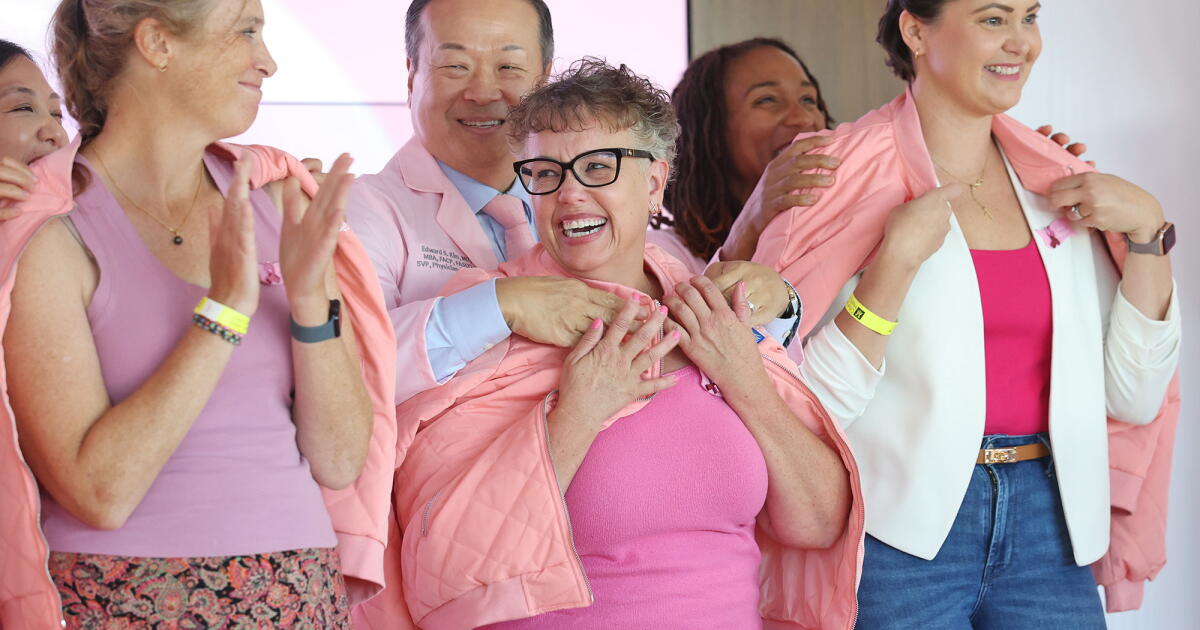 City of Hope O.C. surprises breast cancer survivors with pink jackets