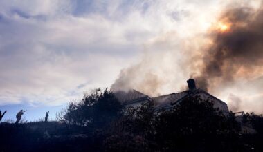 Fire crews battle Southern California blaze that burned 6 homes, led to the evacuation of 16,000