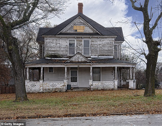 As well as potentially being devastating for individuals if they lose their home, foreclosures can also have a negative effect on whole communities if homes are left vacant (Pictured: An abandoned house on Route 66 in Oklahoma)