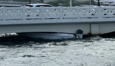 Small boat pushed under Venetian Bridge in Miami