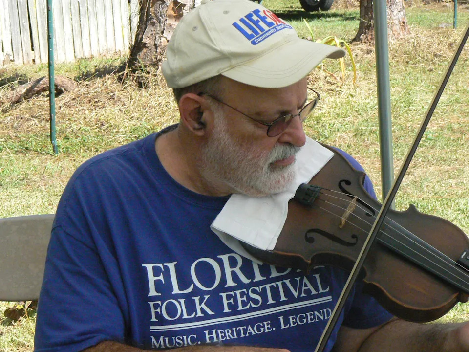 The Fall Country Jamboree at the Barberville Pioneer Settlement is an annual tradition, drawing people from throughout Central Florida. Pictured: Lloyd Baldwin from Branford.