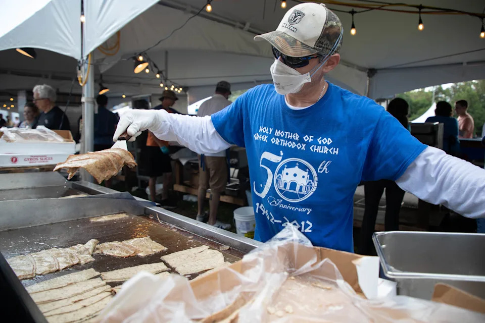 A volunteer cooks gyro meat during the Tallahassee Greek Food Festival at Holy Mother of God Greek Orthodox Church Saturday, Oct. 16, 2021. 