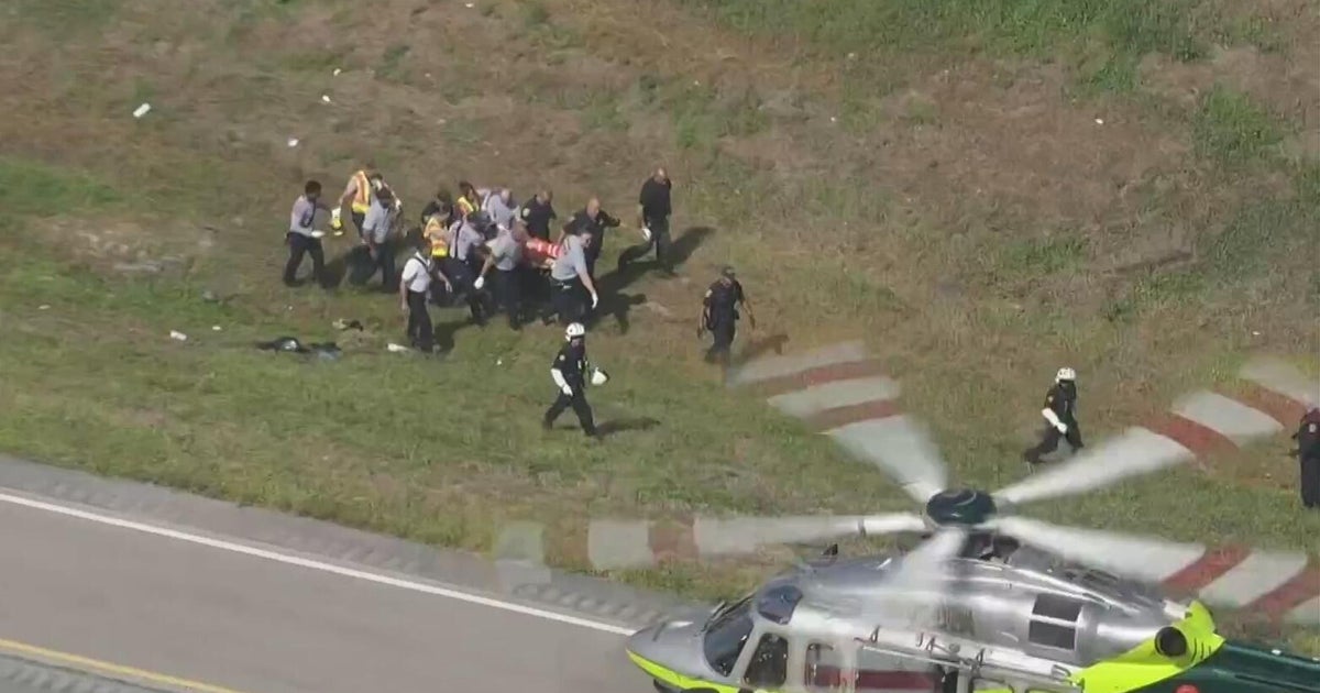 Emergency crews respond to motorcycle crash involving police officer near Hialeah, authorities say