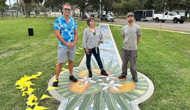 (From left to right) Artists Alex Kaufman, Laura "Miss Crit" Spencer and George Retkes unveiled their 175 foot long walkable Sunshine City Mosaic aimed at drawing visitors to Sunset Park in St. Petersburg on Wednesday. (Spectrum News/Josh Rojas)