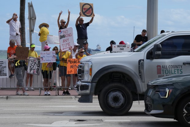 Supporters gather along A1A and Sunrise Blvd. in Fort Lauderdale...