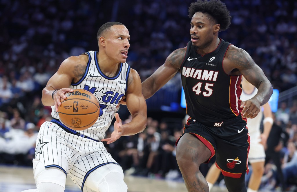 Magic open season with win over Heat