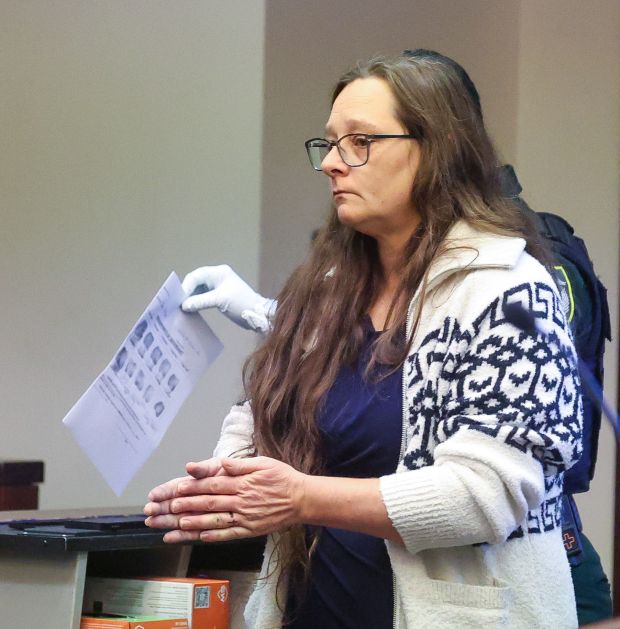 Defendant Tina Allgeo leaves the courtroom after being sentenced in...