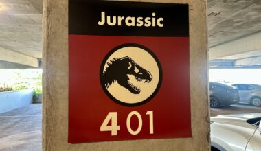 In the parking garage, a sign on a concrete pillar features a dinosaur silhouette with the text "Jurassic 401." It’s as intriguing as finding Butterbeer Treats at Universal Orlando Resort, adding an unexpected twist to your everyday tasks.