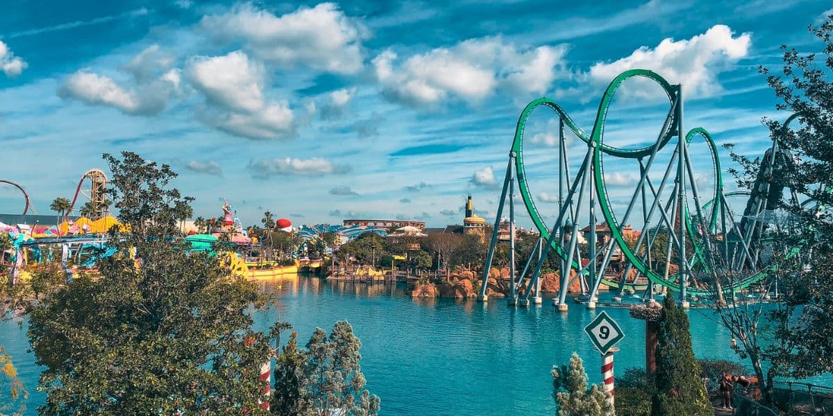 A wide shot of the Hulk Coaster and Suess Landing inside of Islands of Adventure at Universal Orlando Resort