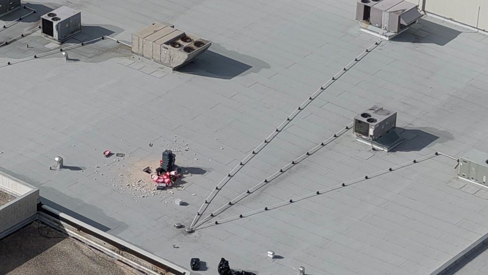 Photos from the scene show scattered boxes and merchandise left behind, offering a glimpse into the chaos of the escape. (MCSO) 