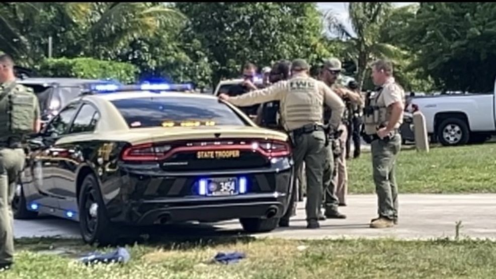 FHP and FWC officers on SE Durant Avenue in Stuart Thursday afternoon. (CBS12 News){p}{/p}