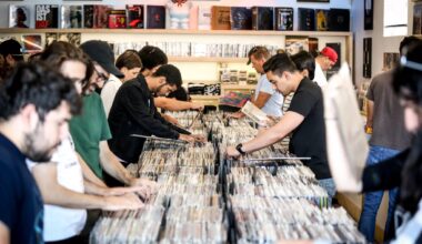 Photo of people buying vinyl records.