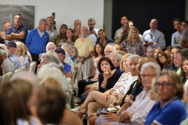 More than 200 people crowded into the Coral Ridge Yacht Club on Tuesday to hear more about the proposed redesign of the Galleria mall. Nearly 300 more watched online. (Mike Stocker/South Florida Sun Sentinel)