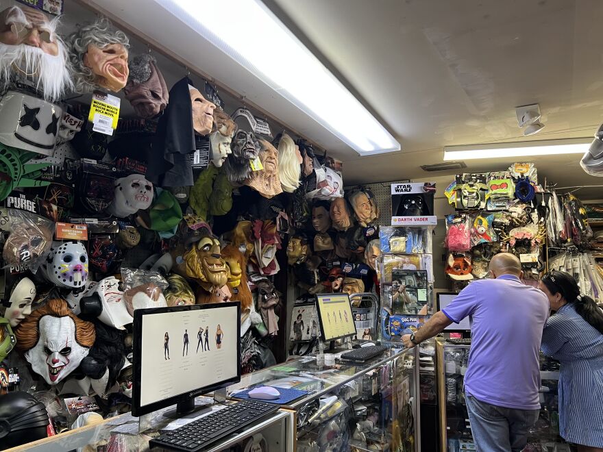 Families browse through the store's 15,000-costume catalog on Oct. 21, 2025.