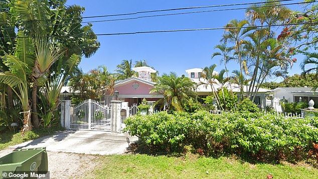 On Saturday, Curran allegedly pushed the mayor 'with both hands,' causing Trantalis to attempt to 'fight him off' at his pink home (pictured), per an arrest report