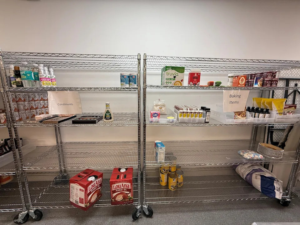 Sparsely filled shelves at the Lutheran Social Services of Northeast Florida food pantry await donations, amid increased demand because of the federal government shutdown. The demand is expected to grow if USDA Supplemental Nutrition Assistance Program benefits are not reinstated.