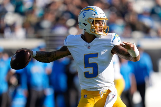 Chargers quarterback Trey Lance throws during the second half of...