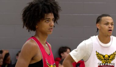 Beckham Black listening to his head coach and step-father David Peavy during practice for Southeastern Preparatory Academy.