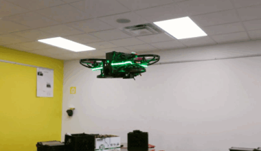 A photo of a drone flying in a classroom.