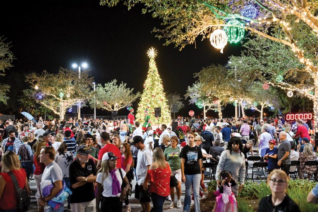 Despite balmy temps, attendees at There’s Snow Place Like Jupiter anxiously await the delivery of 32 tons of snow. Photo courtesy of There’s Snow Place Like Jupiter