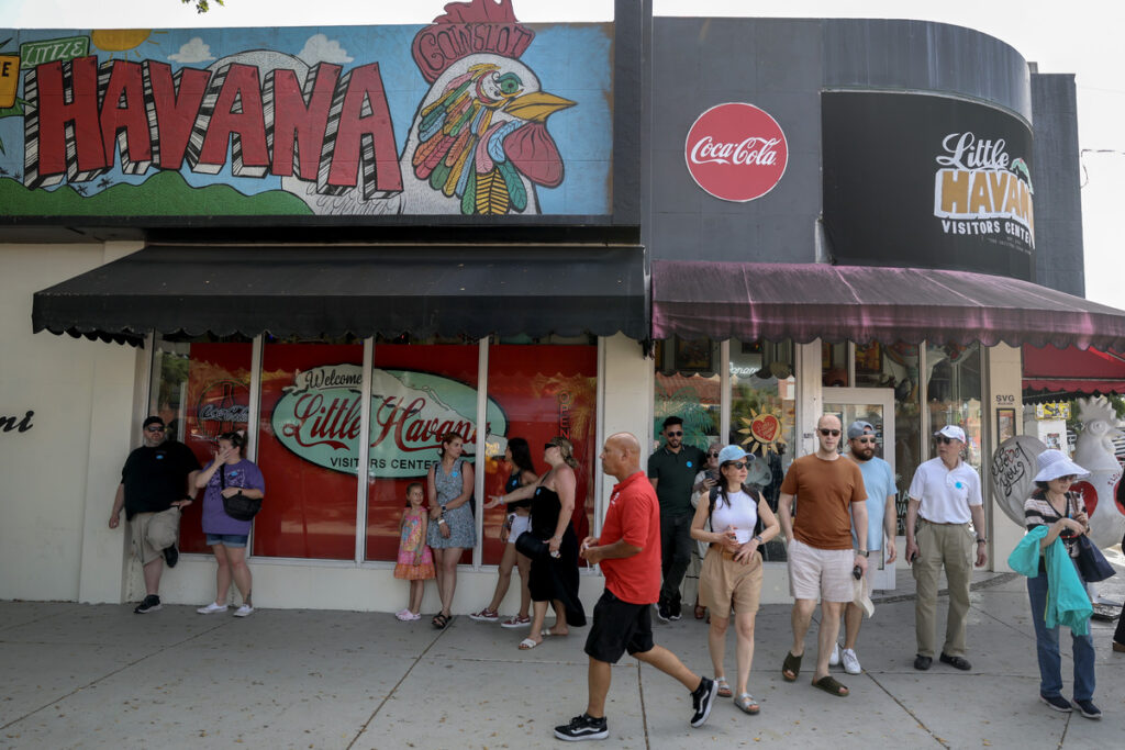 Visitors enjoy the sights in the Little Havana neighborhood on May 30, 2025 in Miami, Florida.