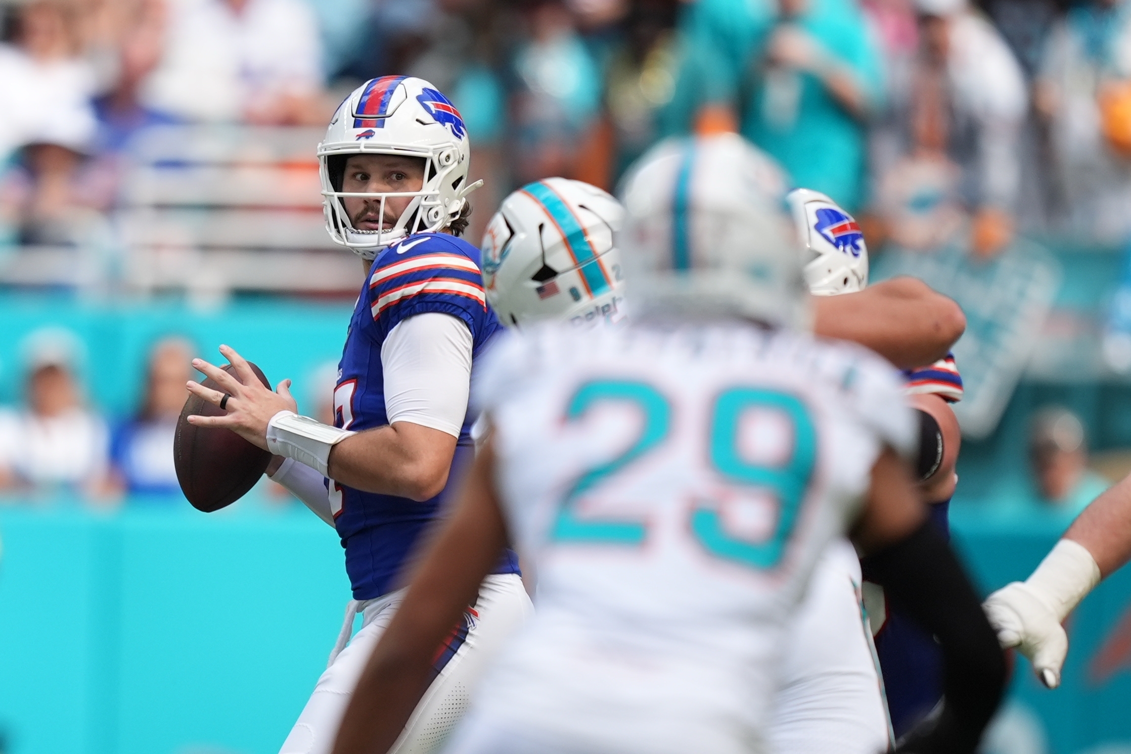 Buffalo Bills quarterback Josh Allen looks to throw during the first half of an NFL football game against the Miami Dolphins, Sunday, Nov. 9, 2025, in Miami Gardens, Fla. (AP Photo/Rebecca Blackwell)