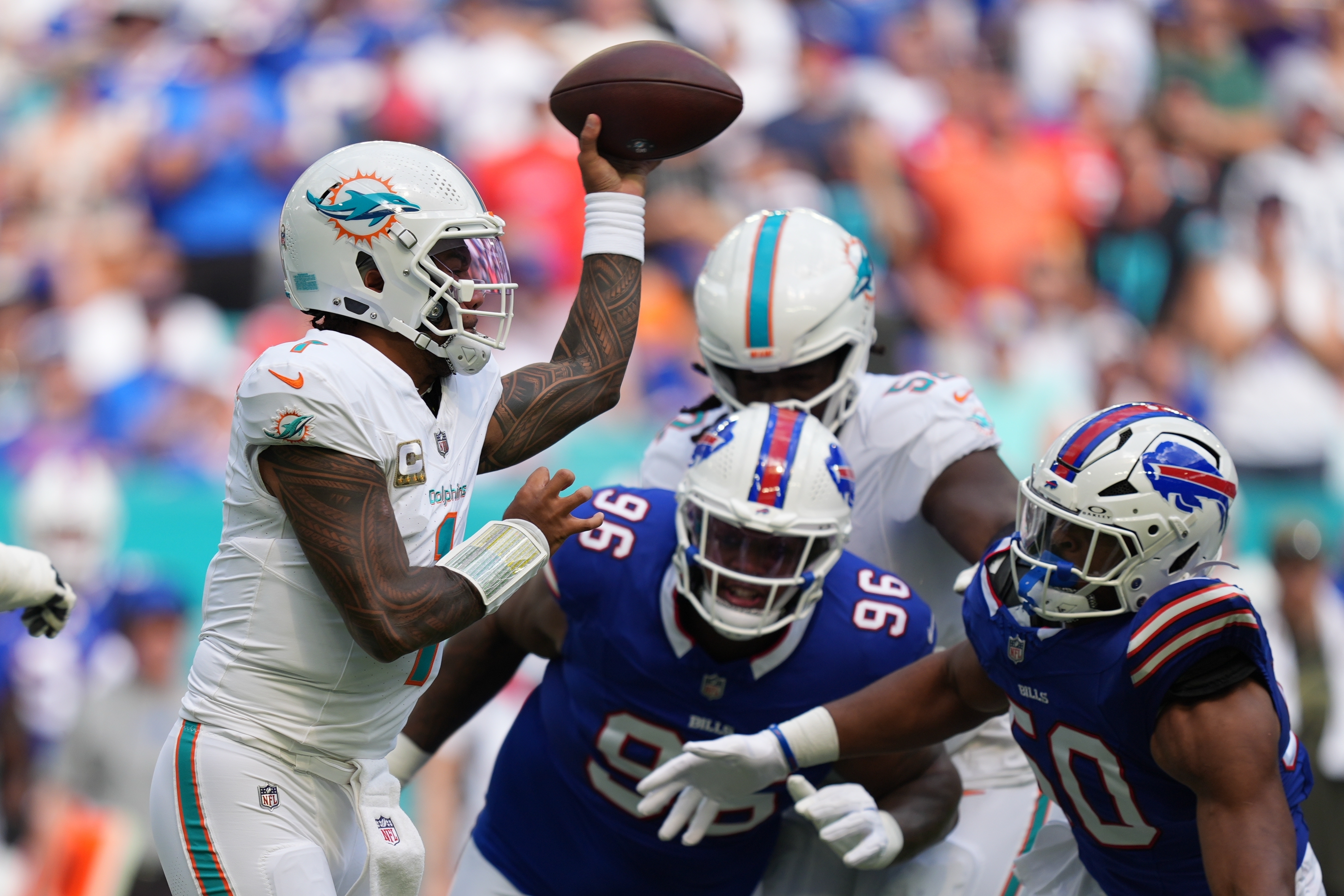 Miami Dolphins quarterback Tua Tagovailoa throws during the first half of an NFL football game against the Buffalo Bills, Sunday, Nov. 9, 2025, in Miami Gardens, Fla. (AP Photo/Rebecca Blackwell)