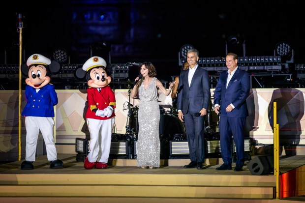 Captains Mickey and Minnie, godmother Susan Egan, Josh D'Amaro, chairman of Disney Experiences and Joe Schott, president of Disney Signature Experiences, christen the Disney Destiny, Disney Cruise Line's new Wish-class ship, during a ceremony at Port Everglades in Fort Lauderdale on Nov. 10, 2025. (Patrick Connolly/Orlando Sentinel)
