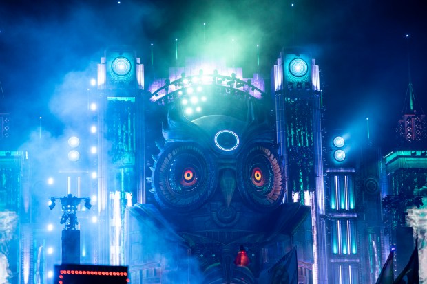 The stage at Kinetic Field features a large owl, lasers...