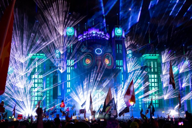 The stage at Kinetic Field features a large owl, lasers...