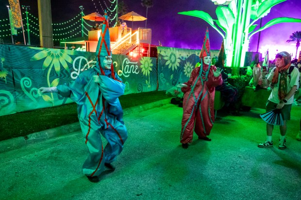 Clowns perform on the street during EDC Orlando at Tinker...
