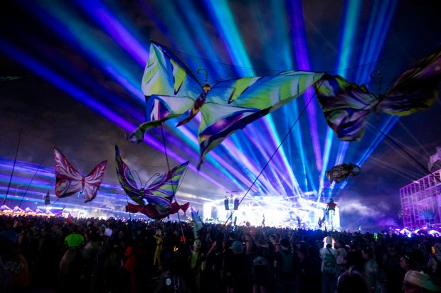 Butterflies soar behind the crowd at the Circuit Grounds stage...