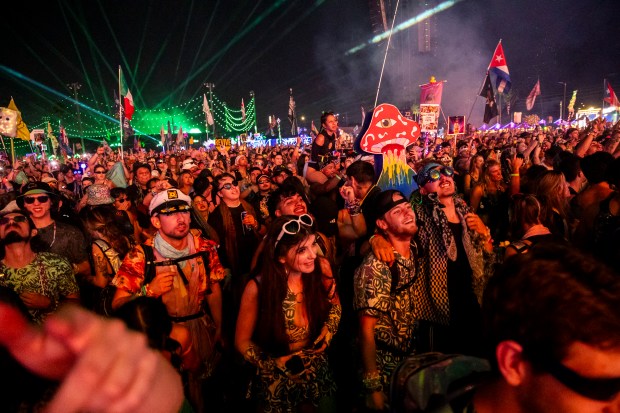 Fans enjoy a set from music producer Wooli at the...