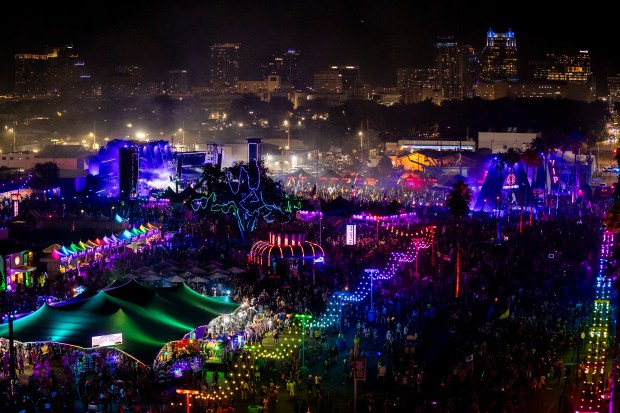 The Orlando skyline can be seen in the background during...