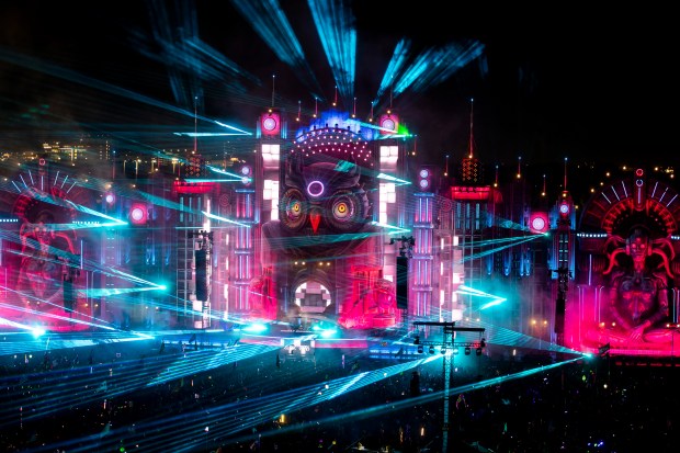 Lights and lasers burst over the crowd at Kinetic Field...