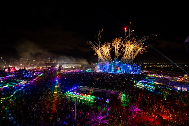 Fireworks burst over the Kinetic Field stage on the final...