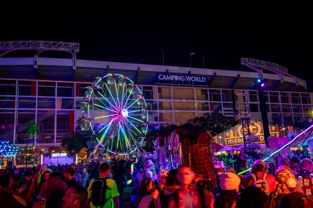 Tens of thousands of attendees pack into the grounds surrounding...