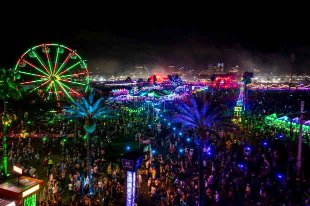 Tens of thousands of attendees pack into the grounds surrounding Camping World Stadium during EDC Orlando at Tinker Field outside of Camping World Stadium on Nov. 9. (Patrick Connolly/Orlando Sentinel)