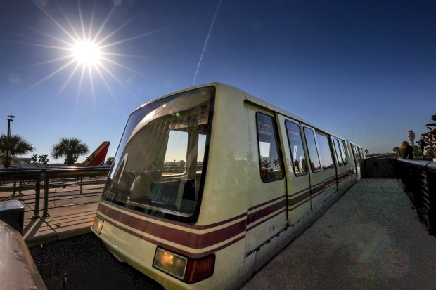 A 25-year-old Bombardier CX-100 tram arrives at Airside 2 at...
