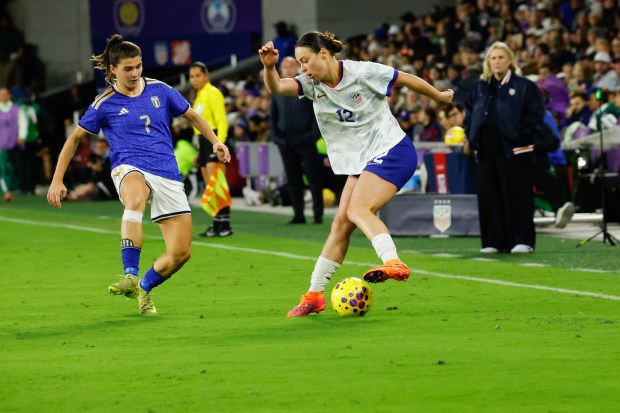 US Women's National Team defender Lilly Reale maneuvers the ball...