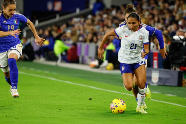 US Women's National Team midfielder Alyssa Thompson moves the ball...